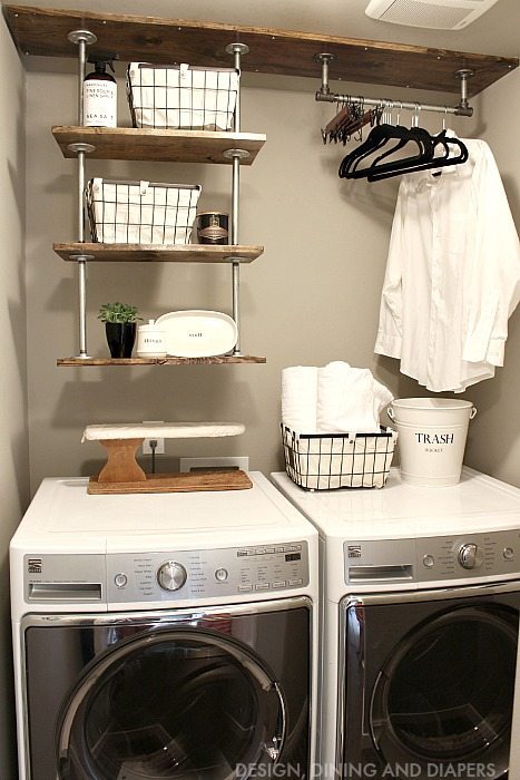 Learn how to create this DIY Industrial Laundry Room Shelving for a small laundry room! Get the metal pipes at the hardware store and build a unique and practical system to help you stay organized!