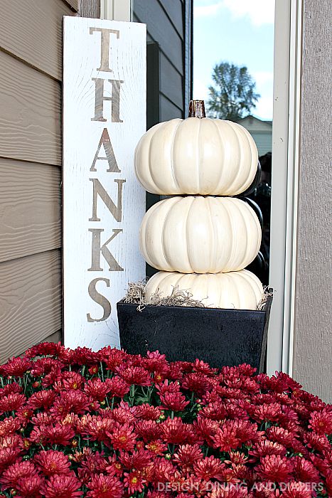 Create this pumpkin topiary to give your porch an elegant fall look. 