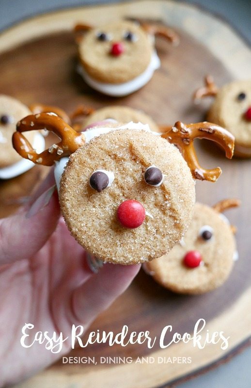 Looking for a quick an easy holiday treat? try these Easy Reindeer Cookies made from store bought sugar cookies, frosting and pretzels! #holidaytreats #ChristmasCookies