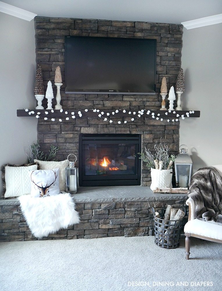  Cozy Winter Mantel filled with winter white decor and decorative trees