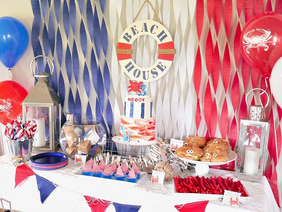 Adorable naturical themed party display! This crab party decor is too cute along with all the nautical decor.