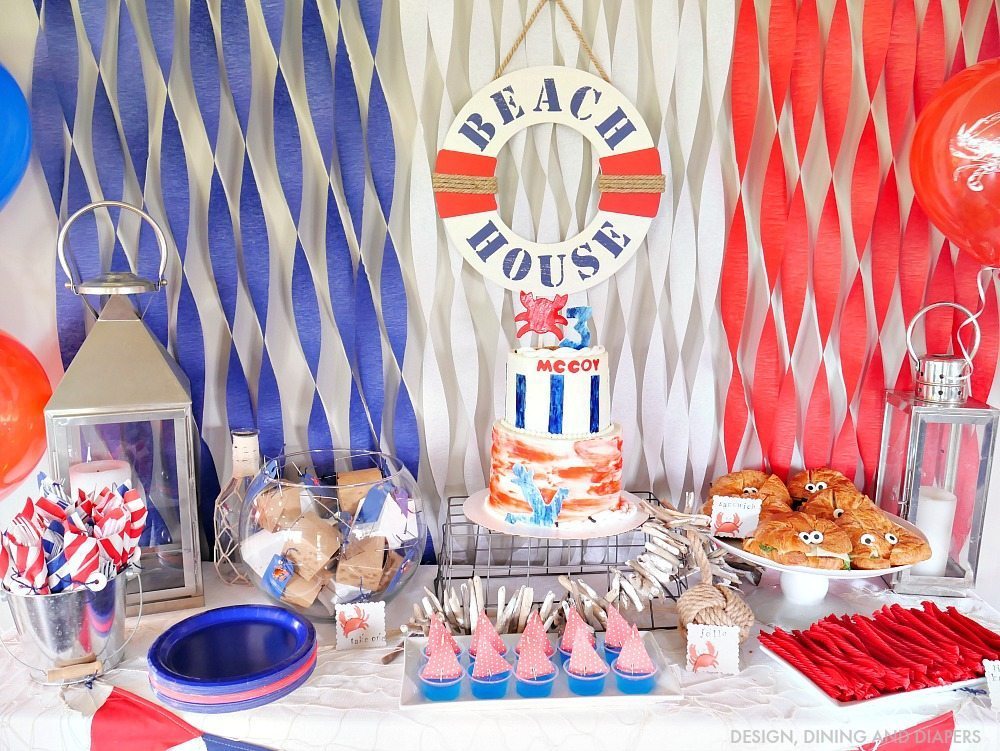 Nautical Birthday Party Ideas! This red, white and blue themed party is perfect for kids of any age. Love all the crab party decor and fun food ideas.