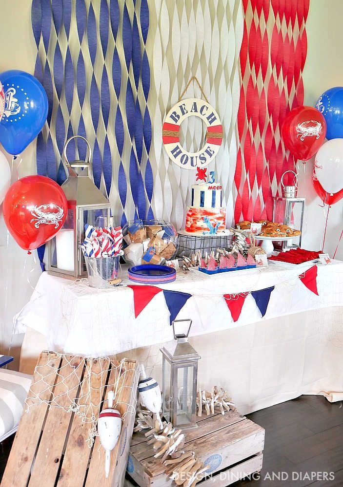 Look at this adorable Nautical Themed Birthday Party! I love all the crab party decor and food and tons of nautical decor touches. Cute kid's party ideas.