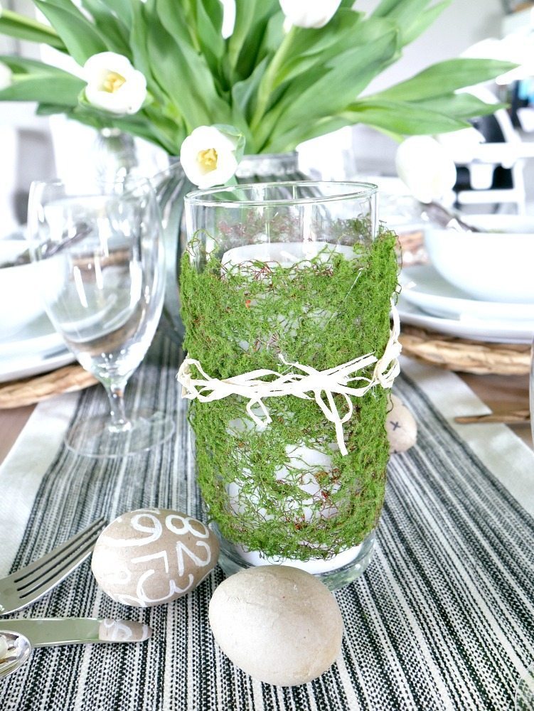 DIY Moss Wrapped Candles - Easy way to add a little spring and Easter decor to your table! Grab a few dollar store vases, moss and raffia! 