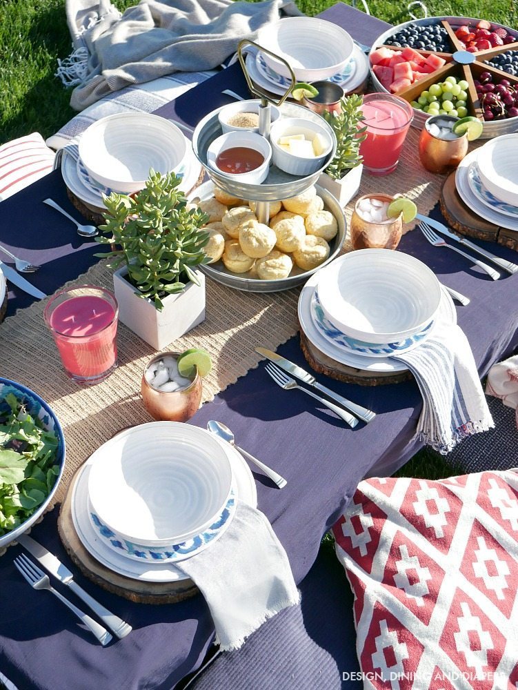 Create a casual Blue and White Backyard Table Setting as your guests sit comfortably on the grass with lots of pillows and blankets! Get tons more summer entertaining ideas on the blog. 