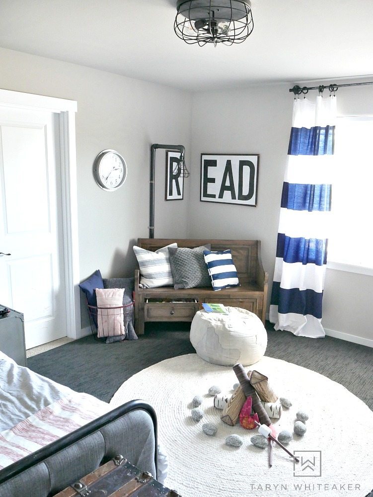 Come take a tour of this rustic boys room with navy black and white decor! Love all the vintage touches and fun accents. 