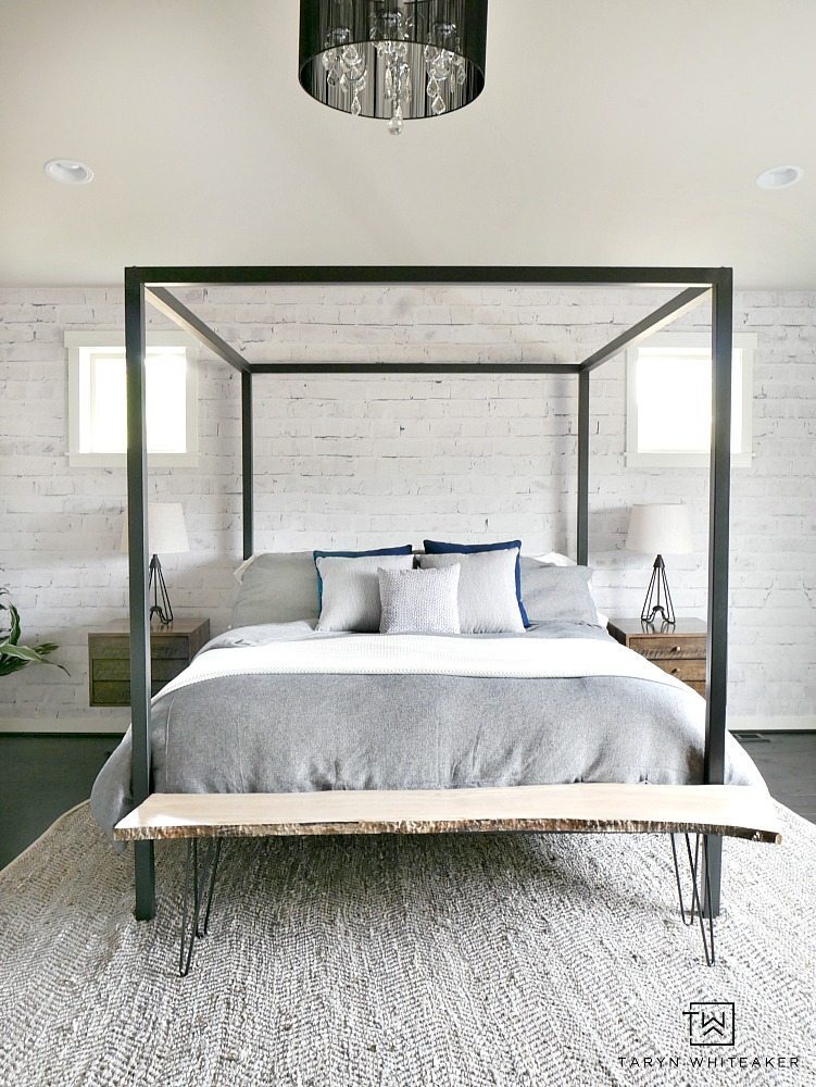 Give your room dimension by adding an accent wall using a white washed brick wall mural from Walls Need Love. This is a removable wall mural that won't damage your walls and is so easy to install. Loving the Rustic Modern look it gives this room. 