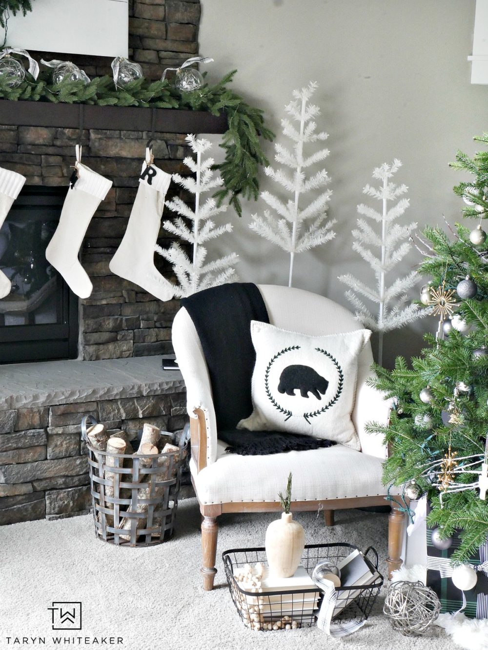 Create a winter wonderland forest in your home with these modern and simplistic trees! Recreate this Neutral Christmas Mantel using lush greenery, winter white and pops of black and plaid. This look is fresh, clean and festive. 