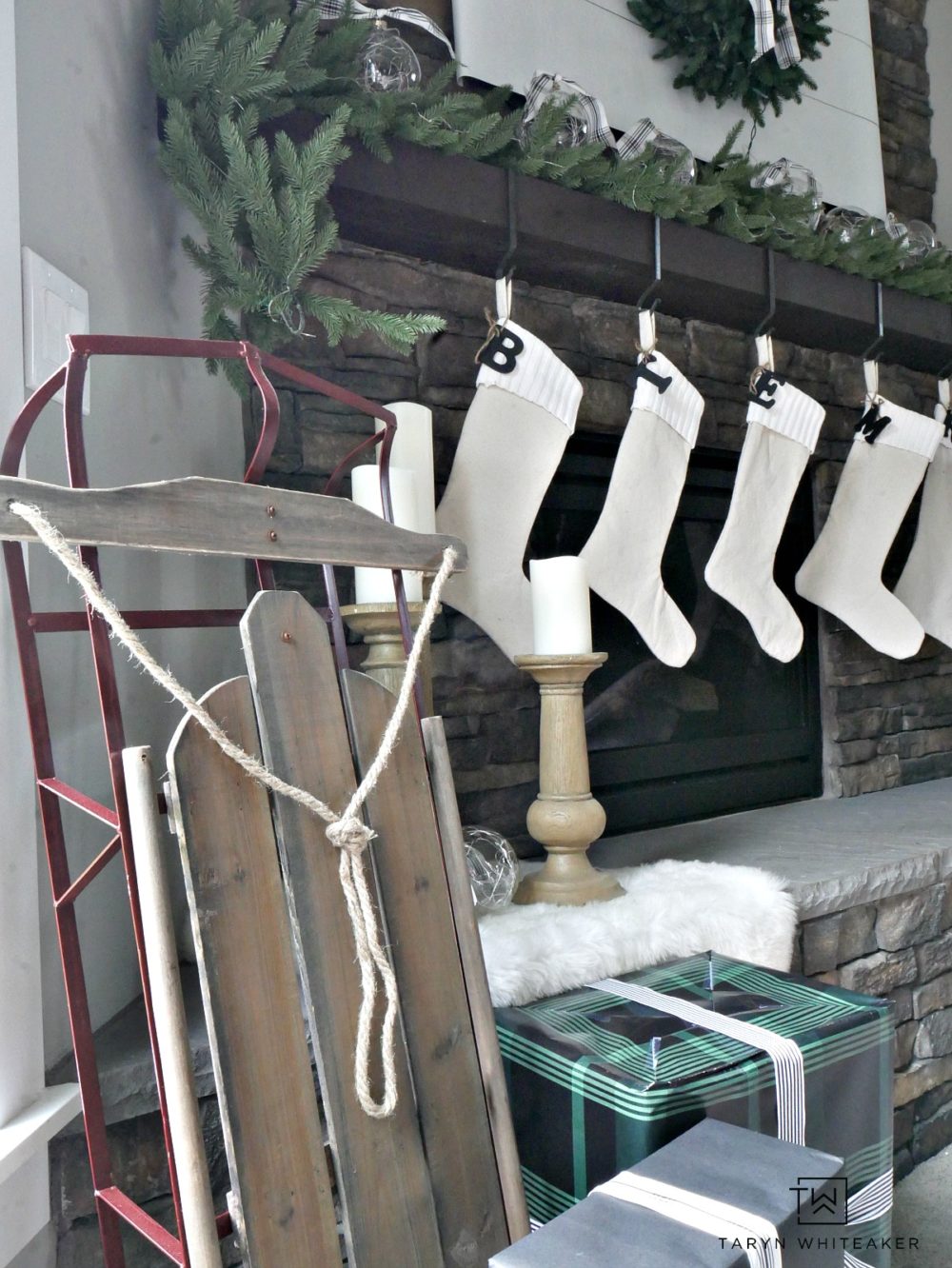 Place a vintage sled near the fireplace to give it a rustic and classic look for the holidays 