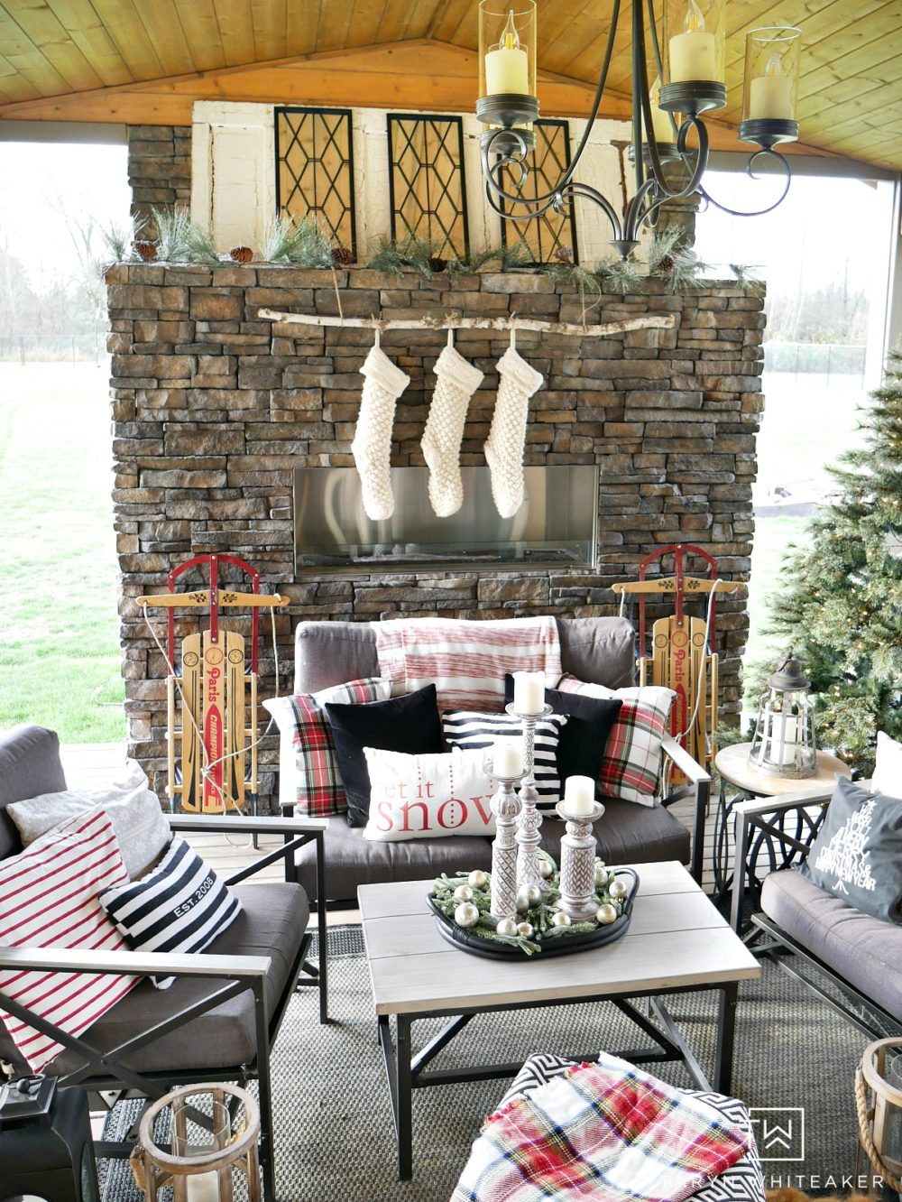 Come see our Outdoor Living Space at Christmas ! It's feeling oh so cozy with it's own Christmas tree, stockings and lots of plaid!