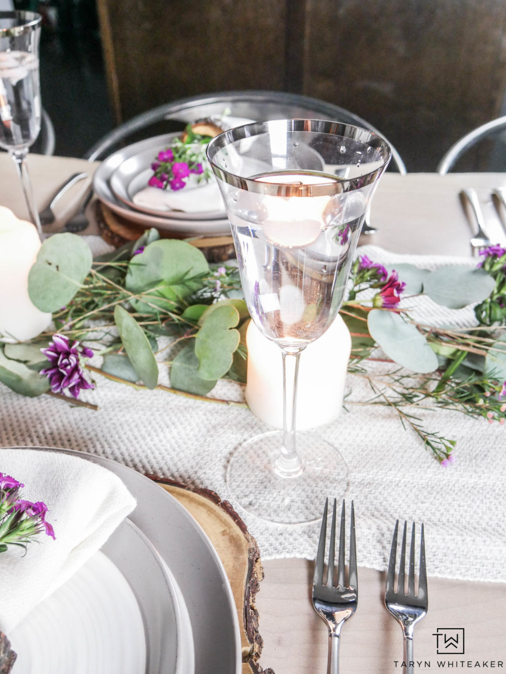 Romantic and whimsical table setting with fresh greens, neutral tones and pops of pink. 