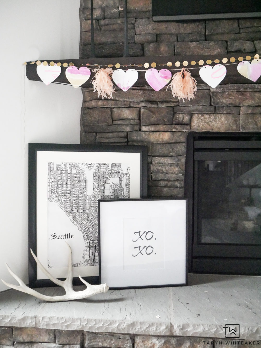 Learn how to create this Simple Valentine's Day Mantel using your kids' artwork! It's always fun to add a little festive cheer to your home especially with handmade art!