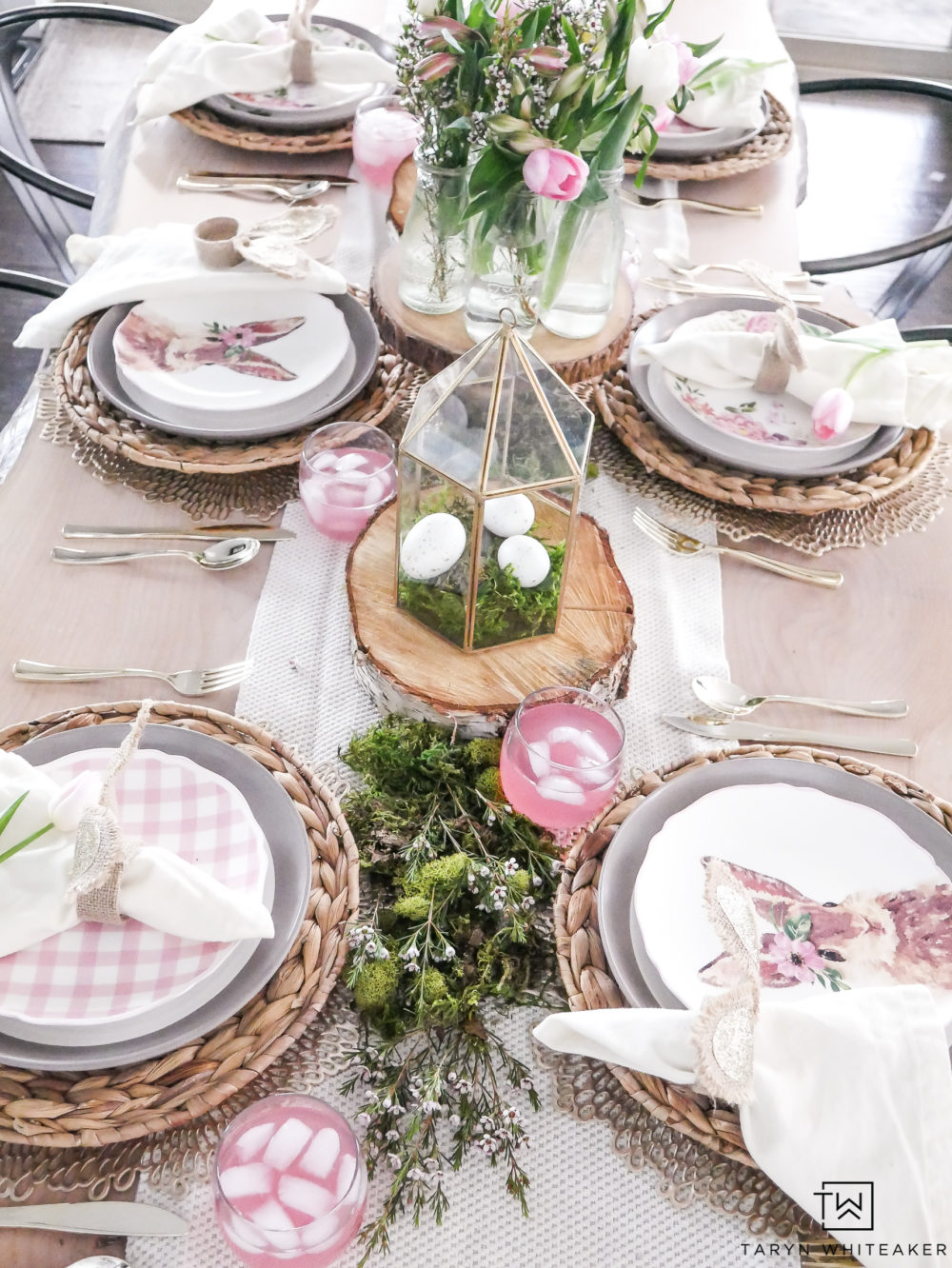 Nature themed Easter tablescape with pink and gold accents. 