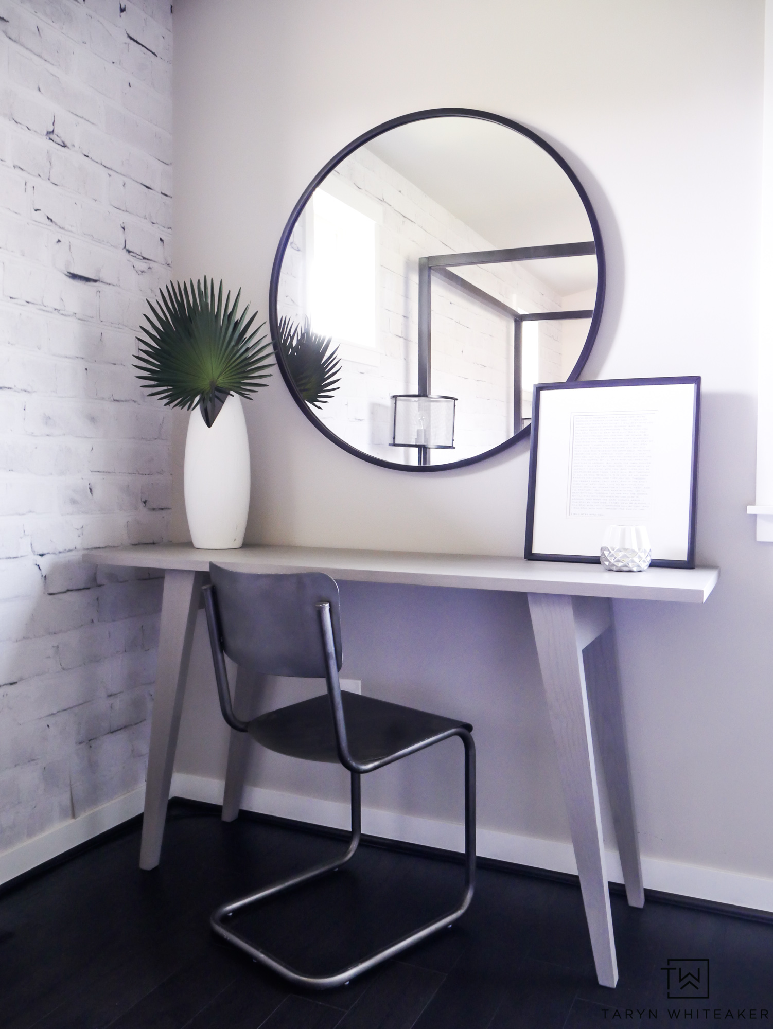 A mid-century modern desk space that can be used for getting ready for a little work! 