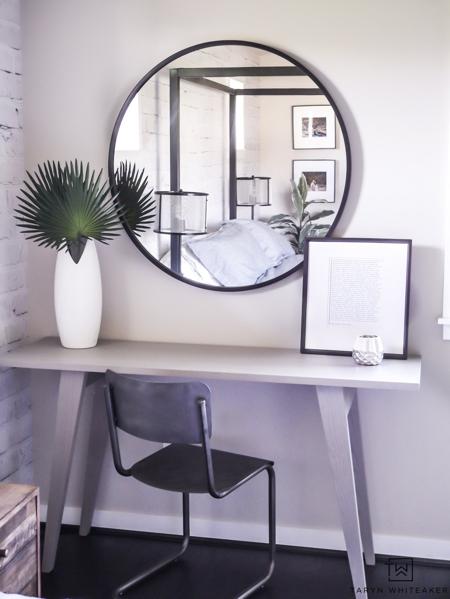 Black round mirrors are all the rage! Love this modern bedroom desk decor!