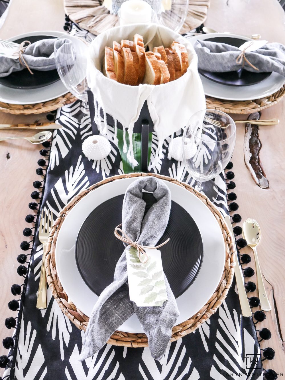 Black and white summer party decor! This tropical dinner party decor is a modern take on a fun summer theme!