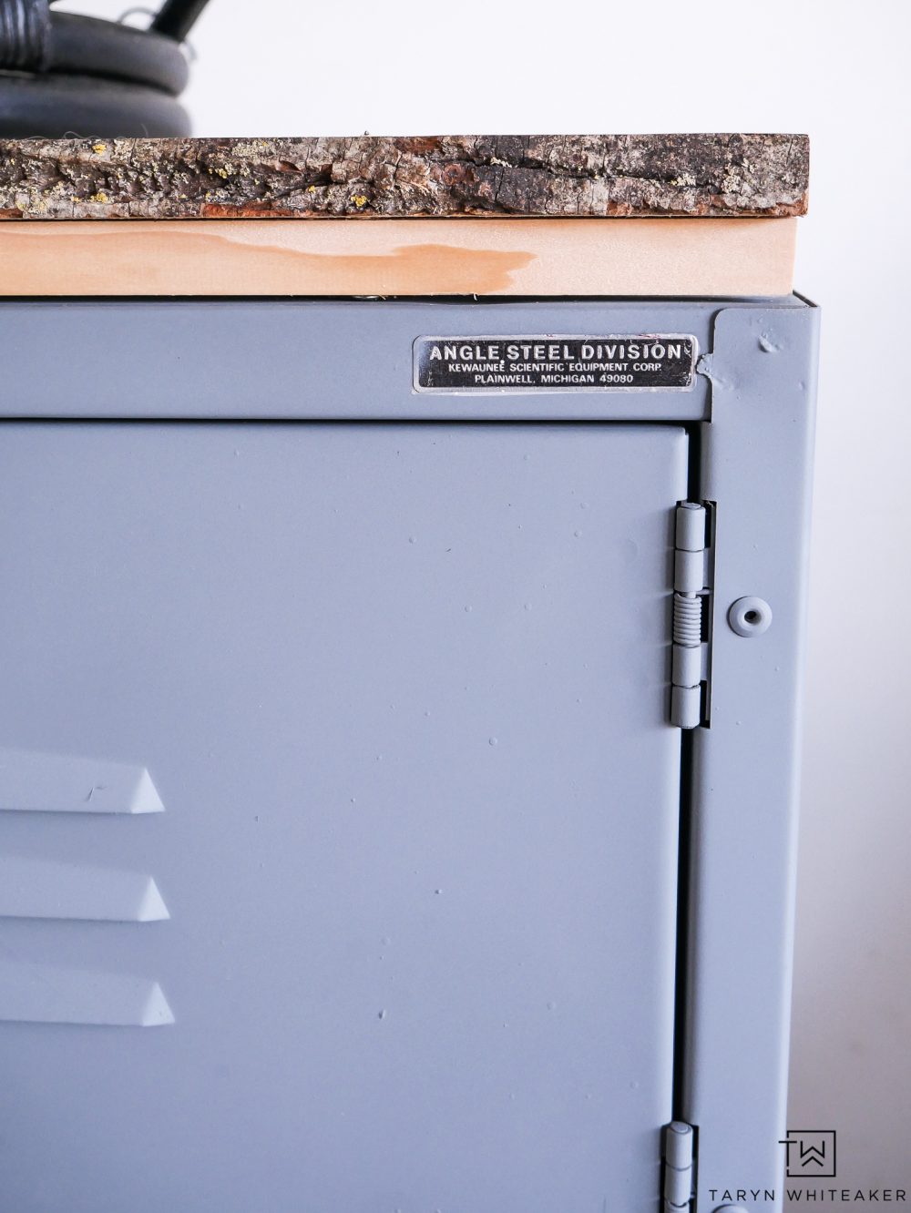 Upcycle a vintage locker with spray paint and a new wood top! 