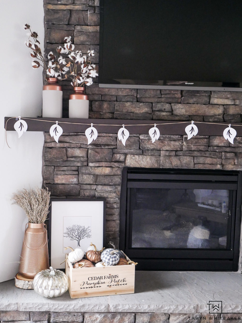 Such a sweet rustic glam fall mantel! This DIY leaf garland is so easy to make using your Cricut machine and little leather rope. 