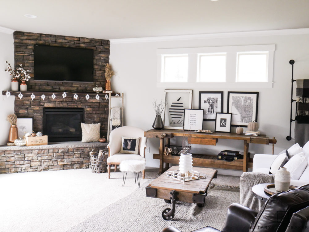 A simple rustic modern approach to fall. Just a few pumpkins and lots of texture to turn this place into fall. 