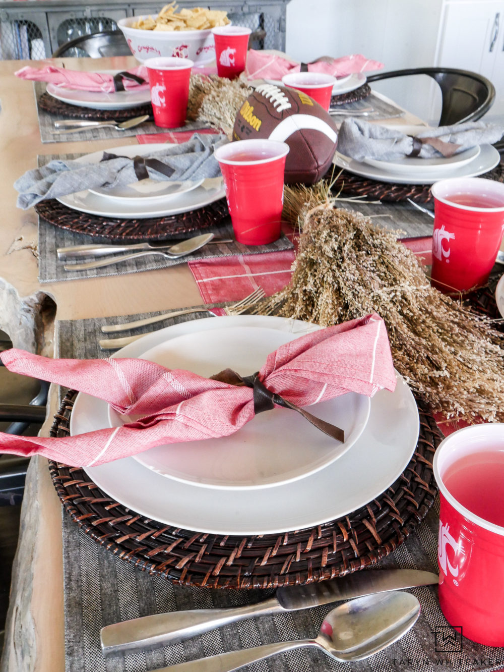 Gear up for game day entertaining! Gear up for football season with this fun football themed tablescape! Your guests will love the casual yet classy football decor to cheer on your team!