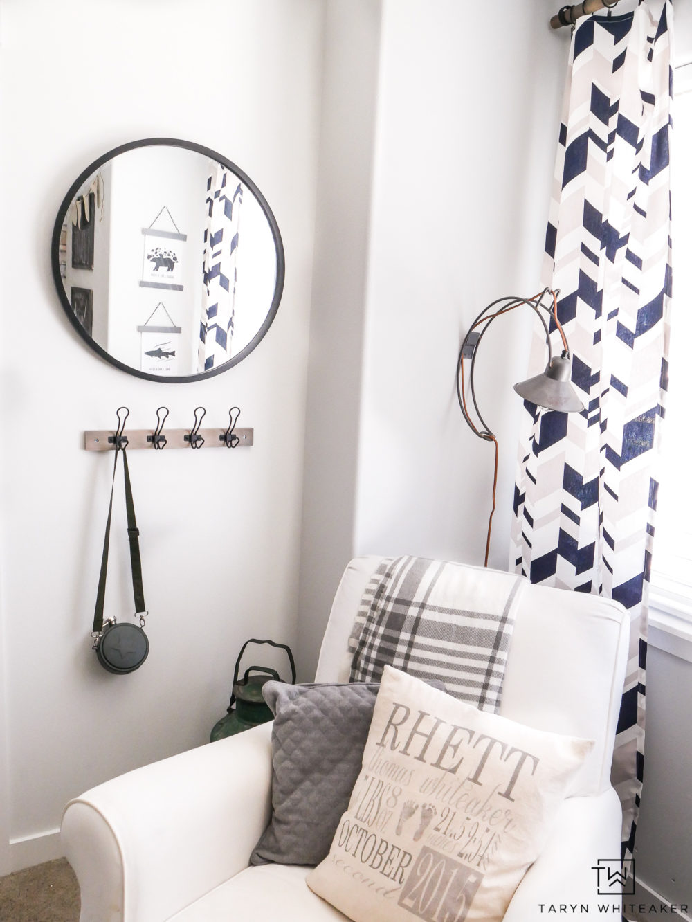 Cozy reading corner in boy's room! Love the circle mirror and geometric curtains. 