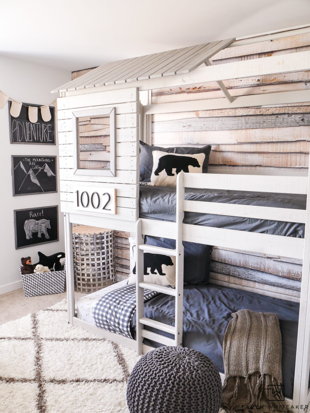 Take a tour of this Modern Adventure Boys Bedroom complete with a treehouse bunkbed and bear accents.