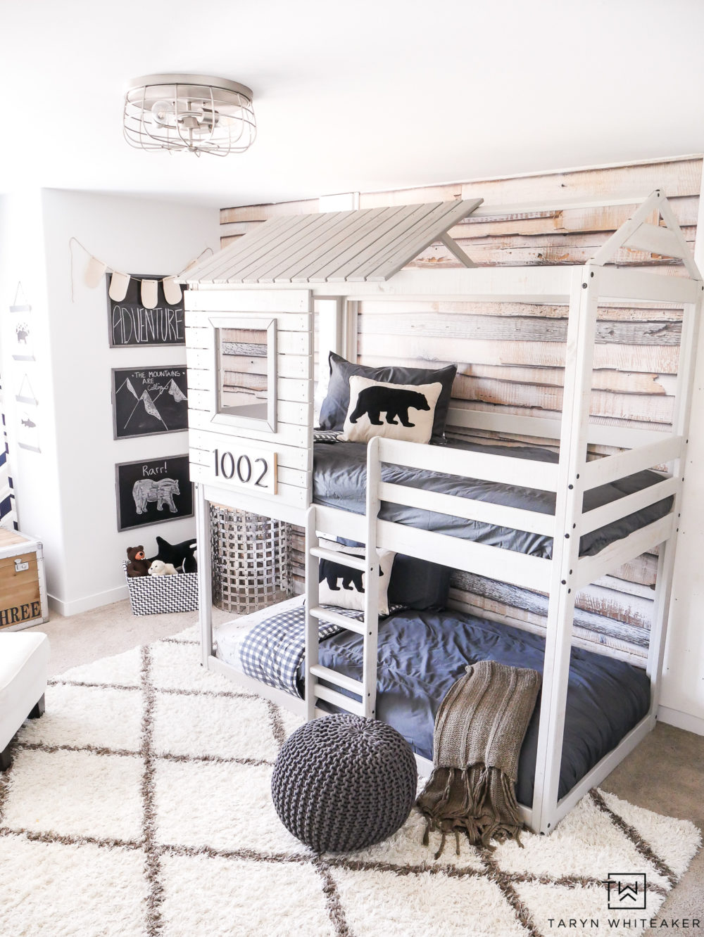 Take a tour of this Mountain Modern Boys Bedroom complete with a treehouse bunkbed and bear accents.