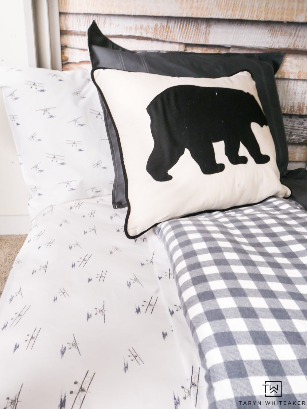 Adorable Eddie Bauer sea plane sheets with black bear accent pillow. Love this modern cabin inspired bedding.