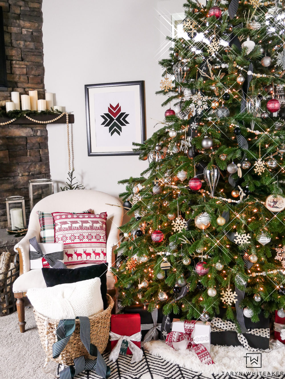 Take a tour of this woodland chic Christmas Tree that used red, black and metal ornaments mixed with natural wood textures.
