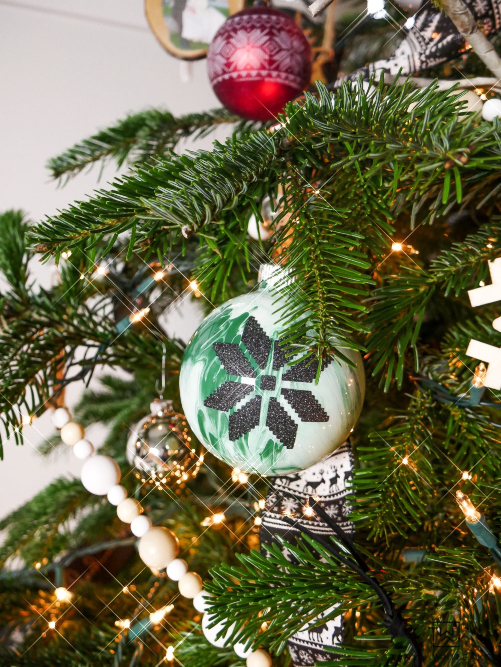 Green and White Marbled Glass Ornament with Nordic Snowflake Design, 