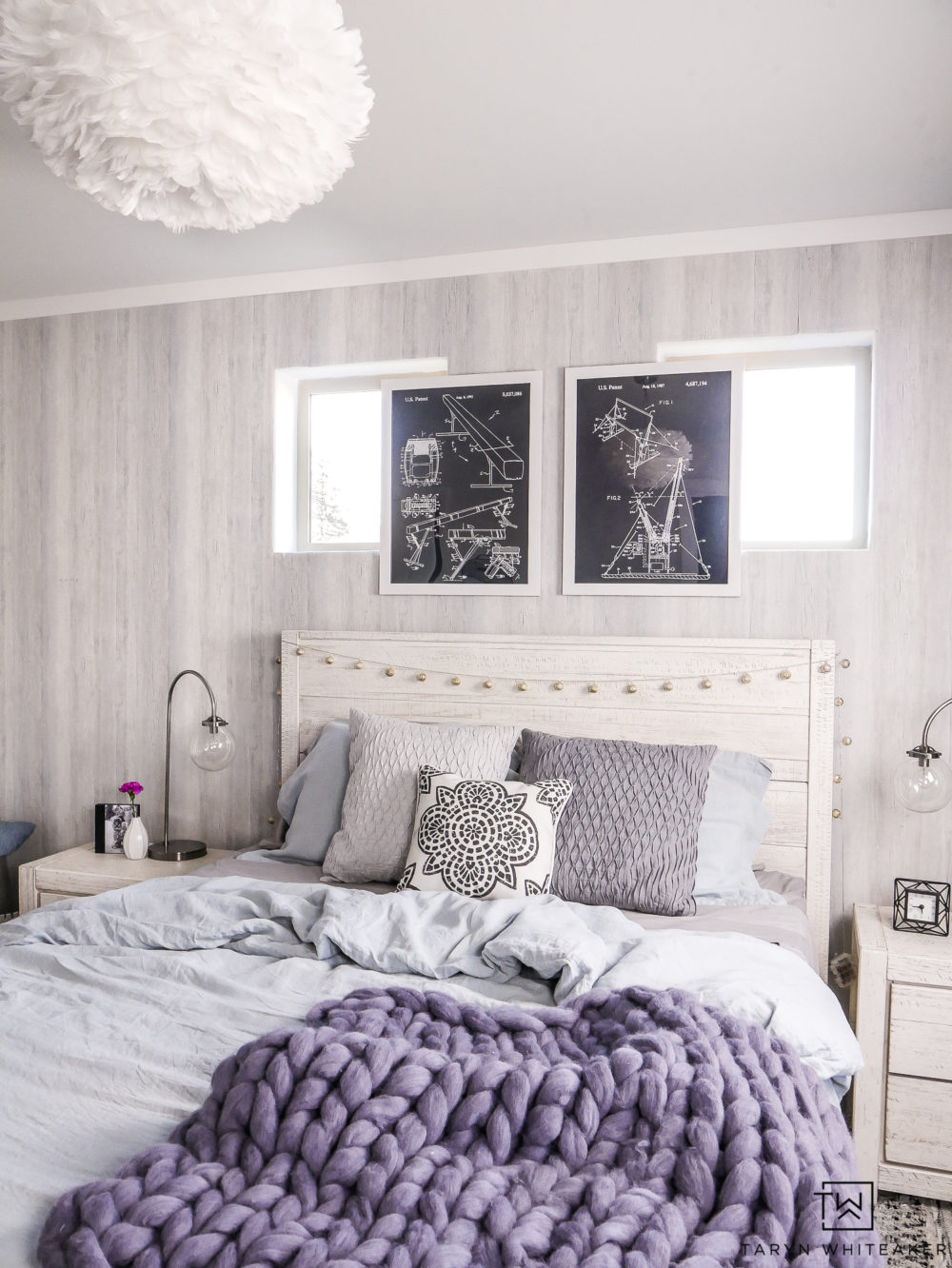 Modern boho girl's bedroom! Love all the soft texture and pops of blue. The textured wallpaper is such a great accent wall. 