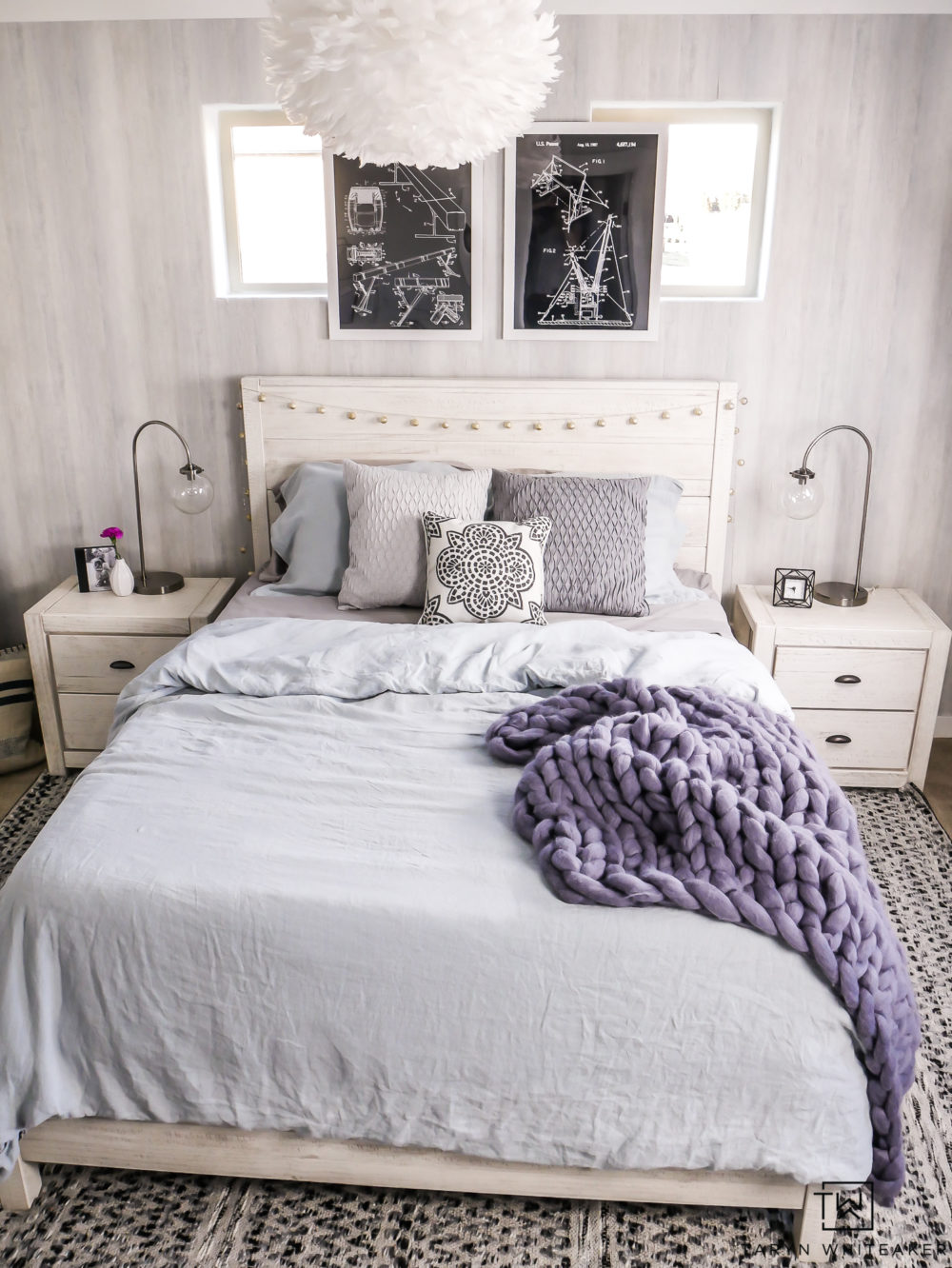 Modern boho girls bedroom with gray, black and white and pops of blue! Love the texture wallpaper and industrial touches. 