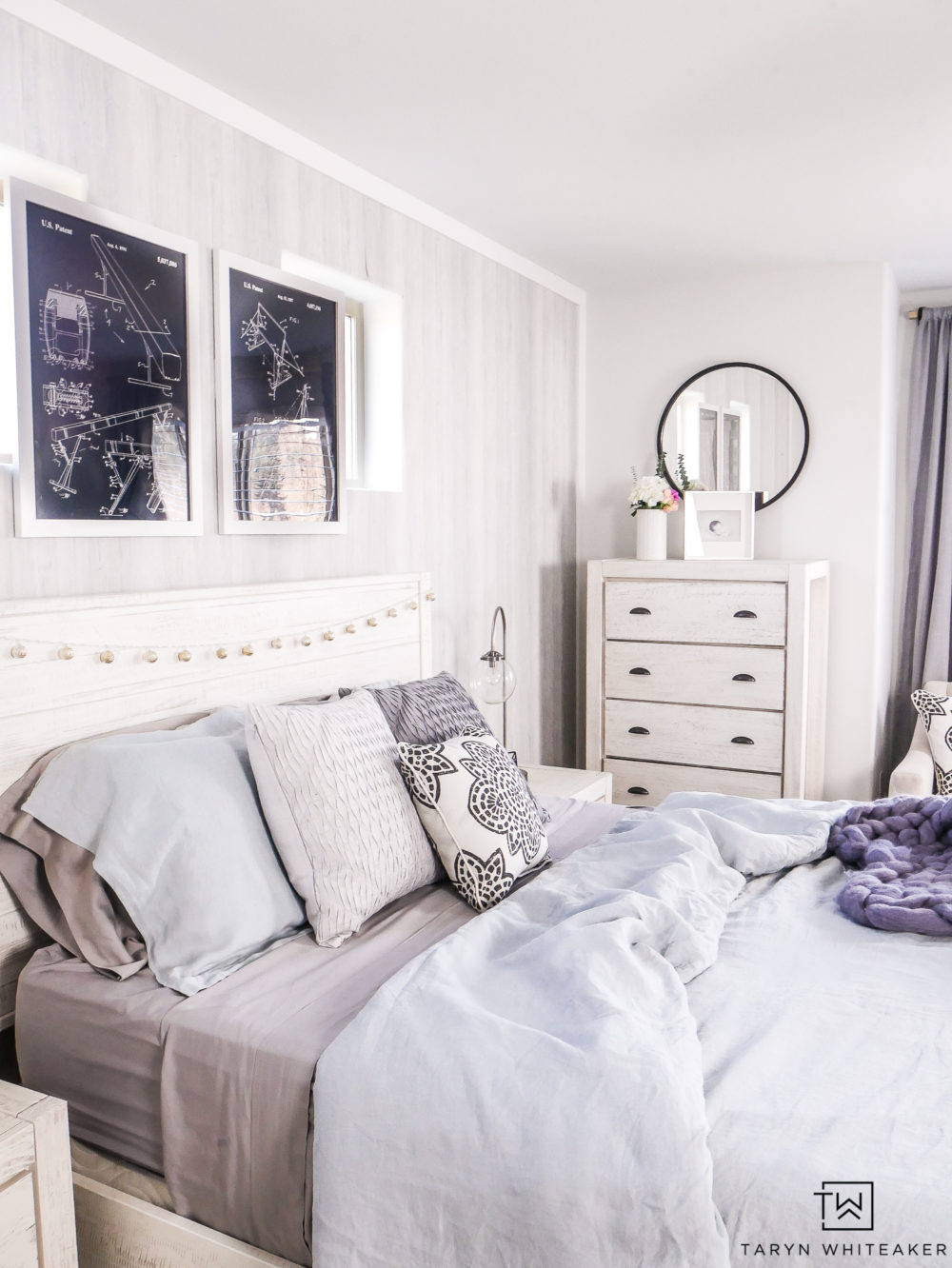 This soft blue girls room has such a great boho coastal vibe. I love the white washed furniture and modern accents.