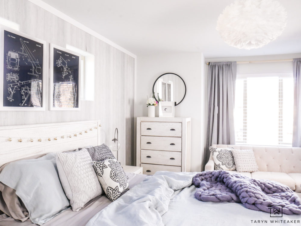 Boho Coast bedroom featuring soft grays and pops of blue! 