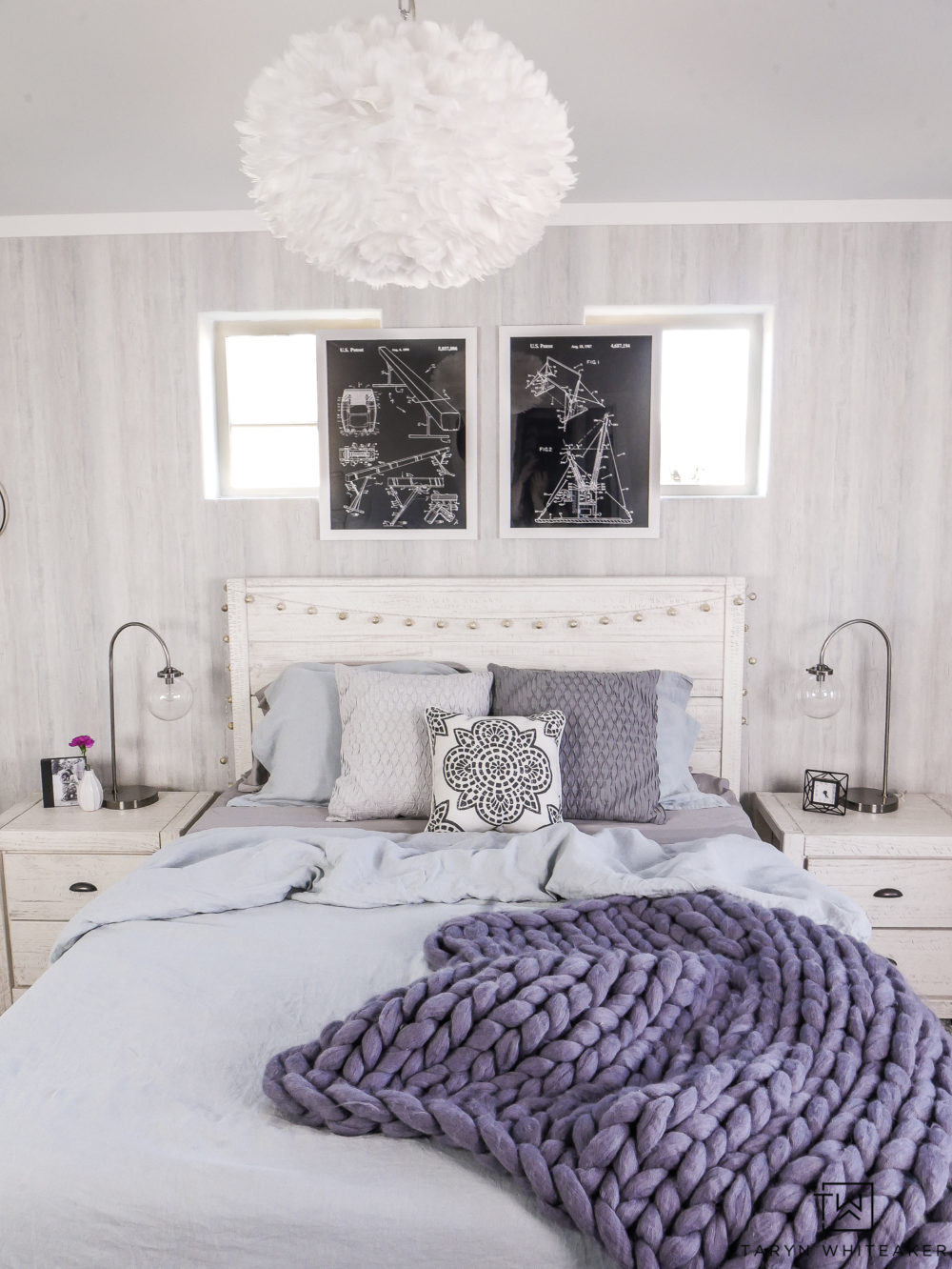 Tour this soft and cozy blue boho girls room! Filled with soft grays and pops of blue. Love the industrial touches. 