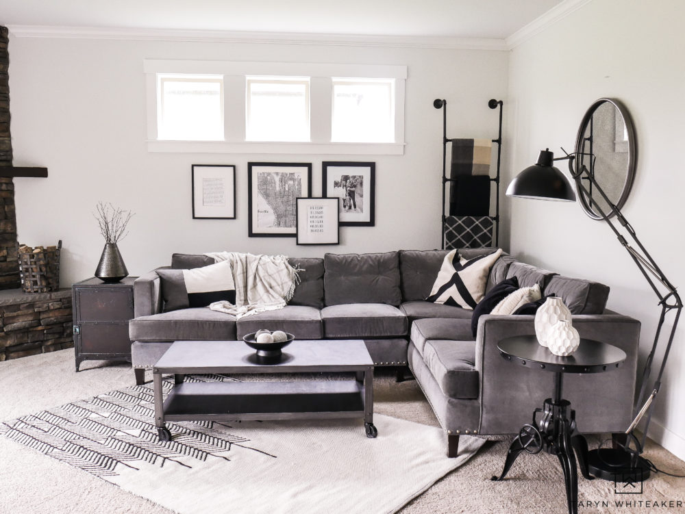 Gray sectional with with black and white decor. Ideas for how to style a corner sectional. 