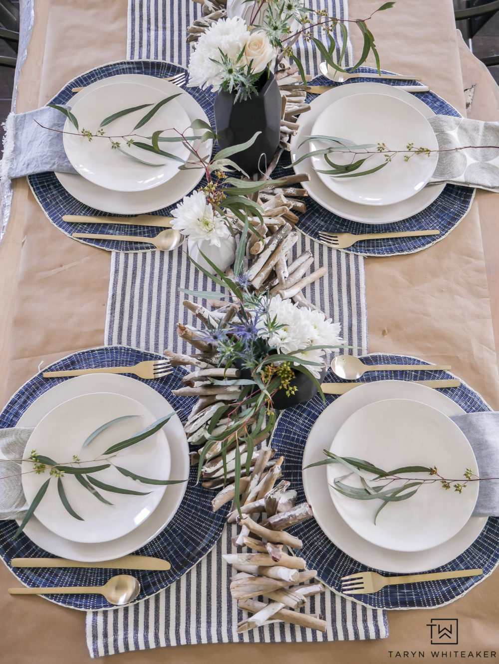 Simple and casual summer table decor featuring navy and white with pops of modern black accessories. 