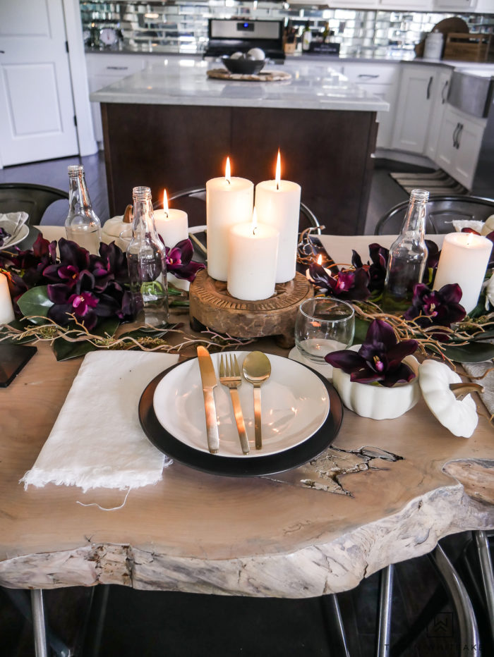 See all the details of this early fall tablescape with black and white fall decor and tons of deep earth tones. This plum fall table decor is so refreshing. 
