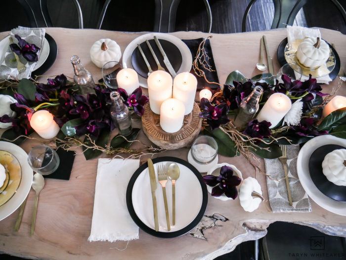 See all the details of this early fall tablescape with black and white fall decor and tons of deep earth tones. This plum fall table decor is so refreshing. 