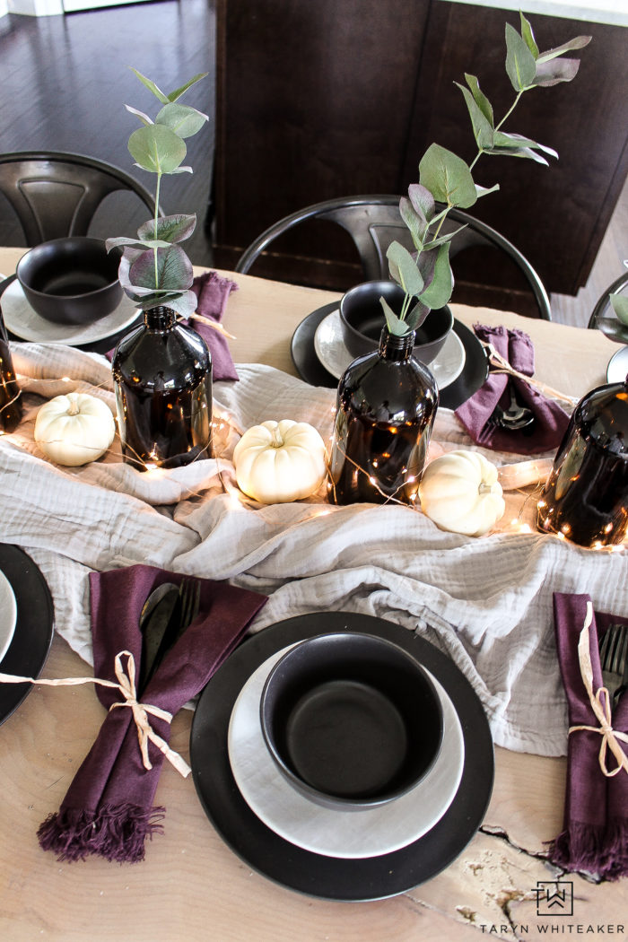 This black and plum fall table is perfect way to keep modern style but also dress your table for the holidays. 