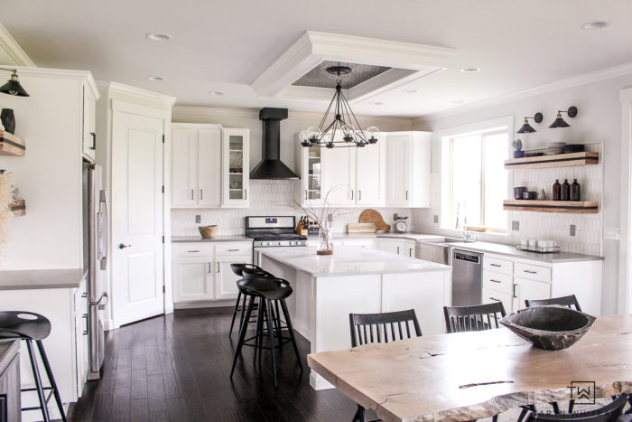 Check out this black and white modern kitchen makeover, the transformation is crazy! Love the rustic modern touches and open kitchen shelves. 