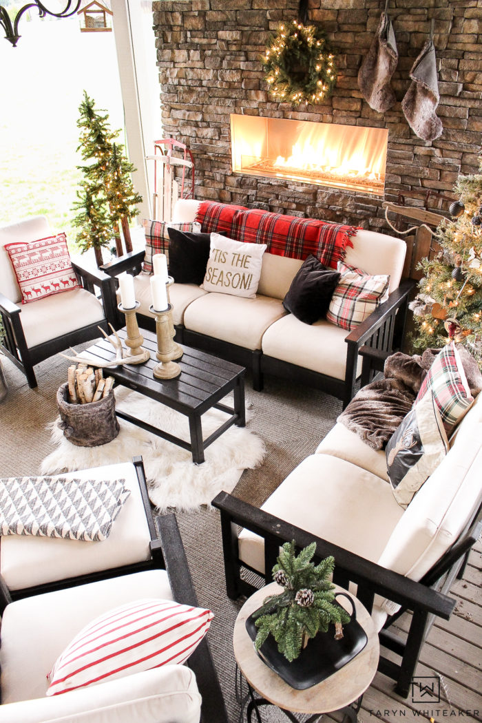 Learn how to get this cabin chic christmas look in your own home using a mixture of woodland christmas decor, tartan print and modern black accents!