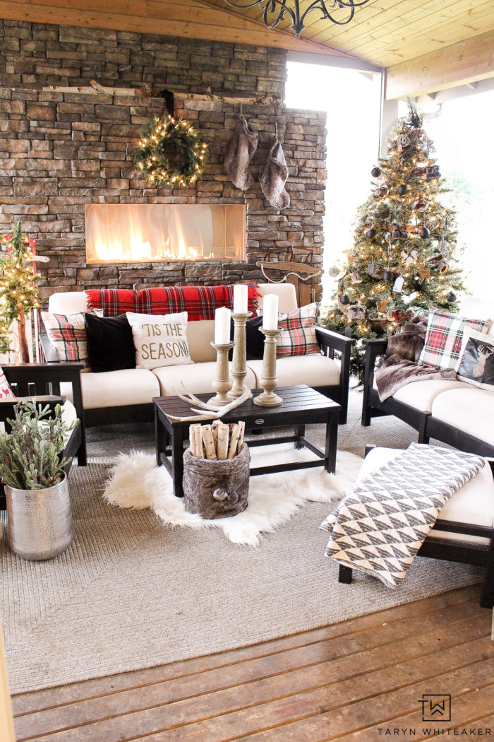 Learn how to get this cabin chic christmas look in your own home using a mixture of woodland christmas decor, tartan print and modern black accents!