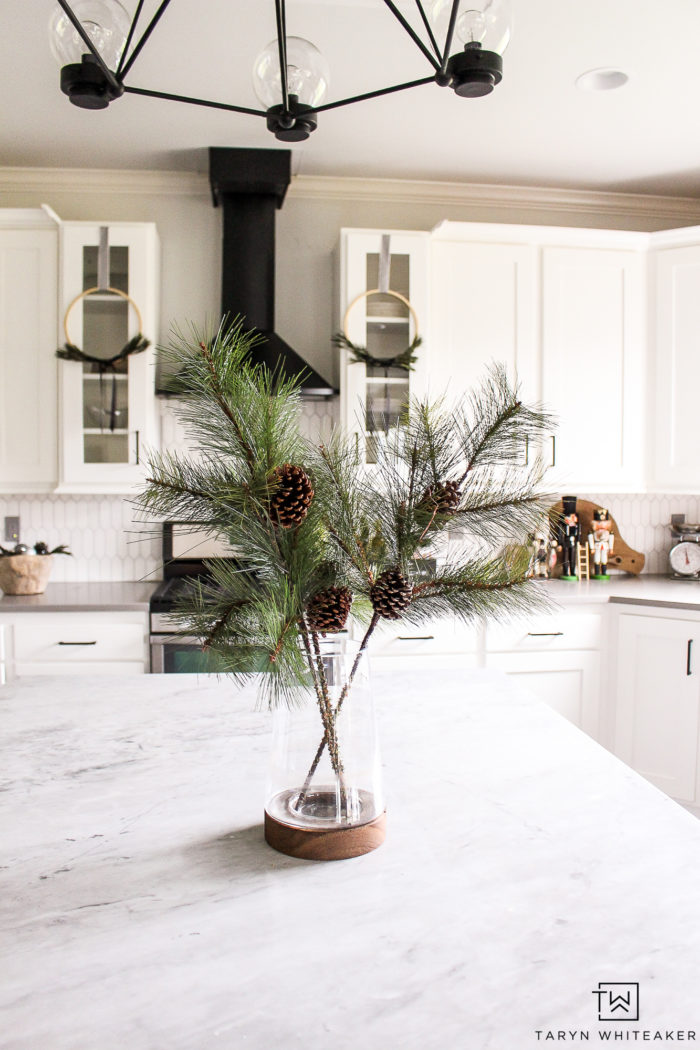 Tips for decorating your kitchen for Christmas! Keep your holiday decor simple and modern with just a few pops of red and green. 