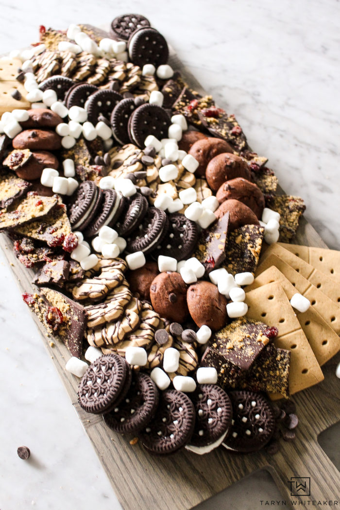 Learn how to create this gluten free dessert board using tons of delicious store bought gluten free cookies and desserts! 