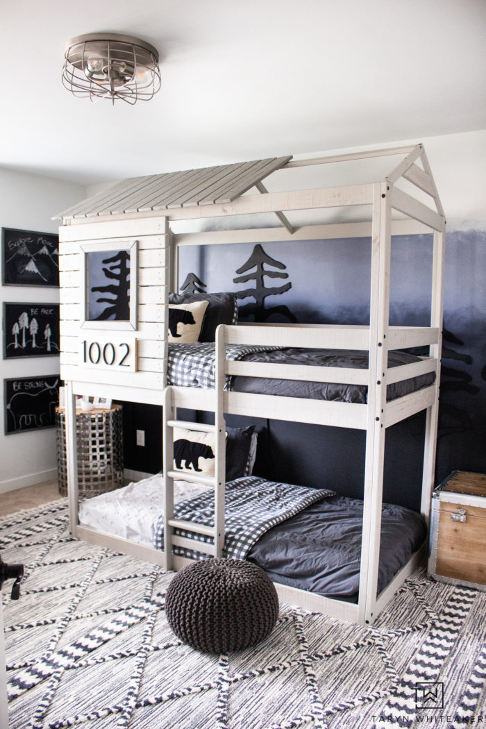 Love this modern adventure boys room complete with a DIY Forest Wall for a big impact. 
