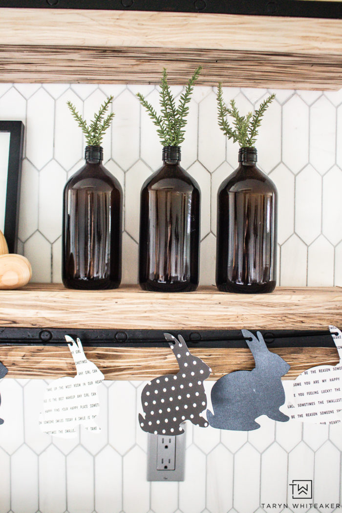Love neutral decor? Here are some ideas on creating a black and white Easter Vignette for your kitchen or shelving decor. Plus grab a free Easter printable. 