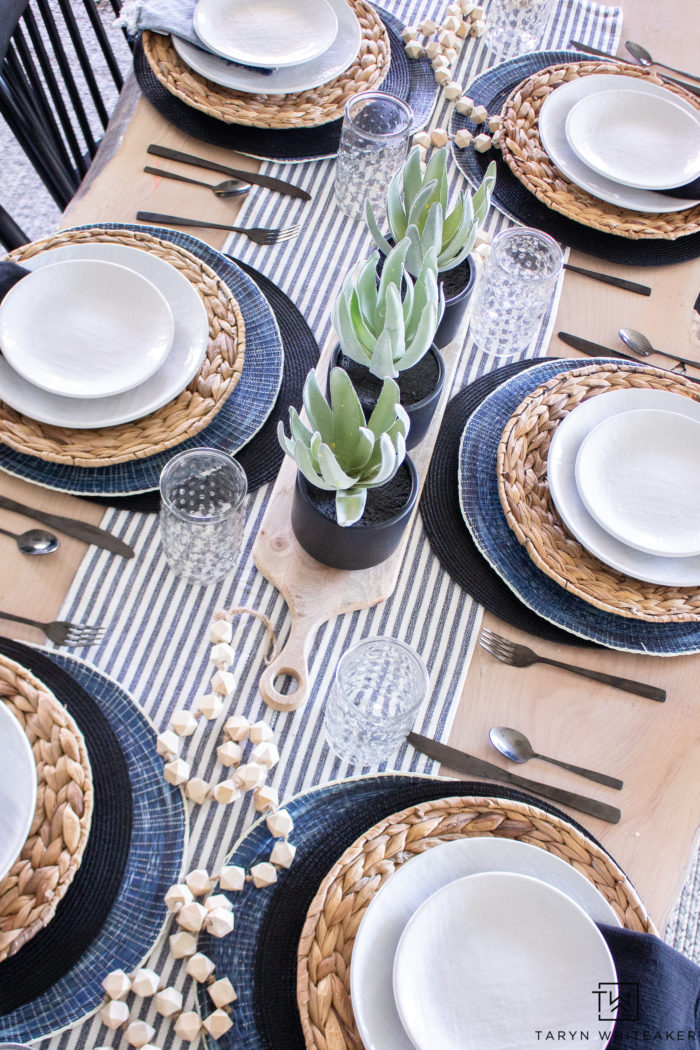 This Minimalistic Spring Table Decor allows you to add a pop of spring to your home while still keeping it clean and modern. Love the black and white decor. 