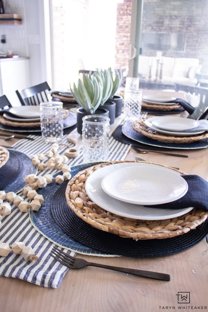 Black and navy spring table decor using lots of textures. 