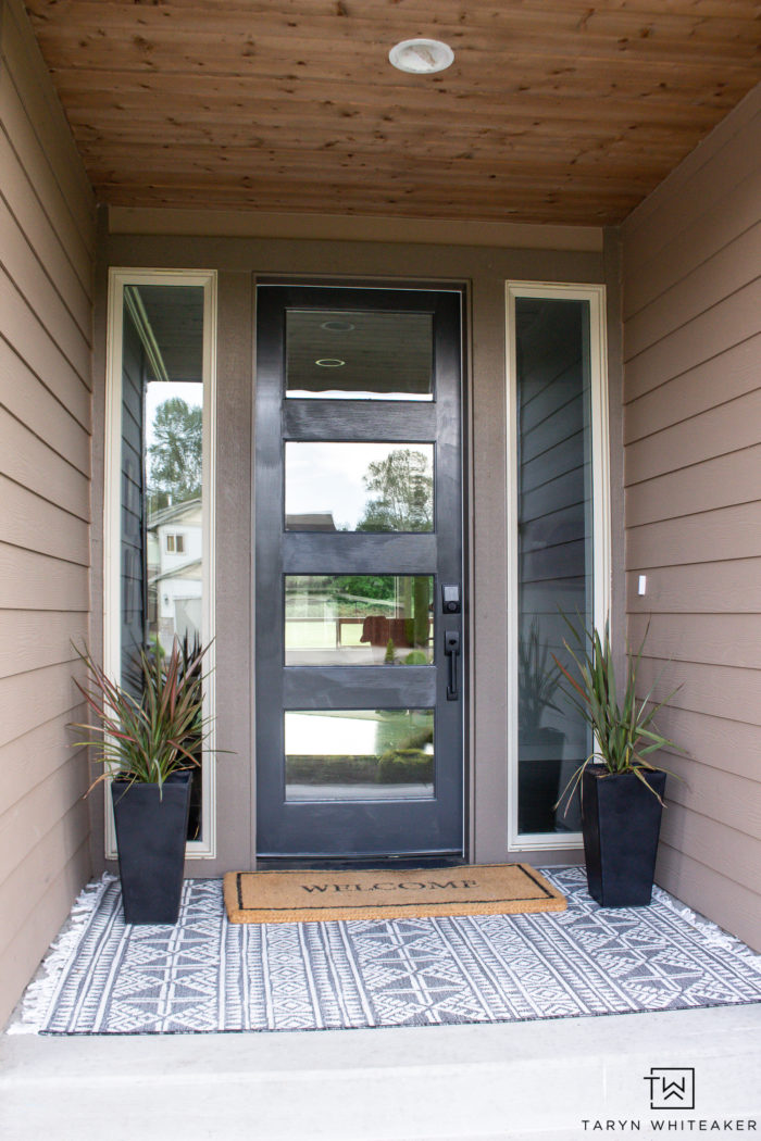 Spruce up your curb appeal with these Summer Porch Updates! Paint your door a bold dark color and plant a few fruit trees! Fresh mulch always makes your landscape pop!